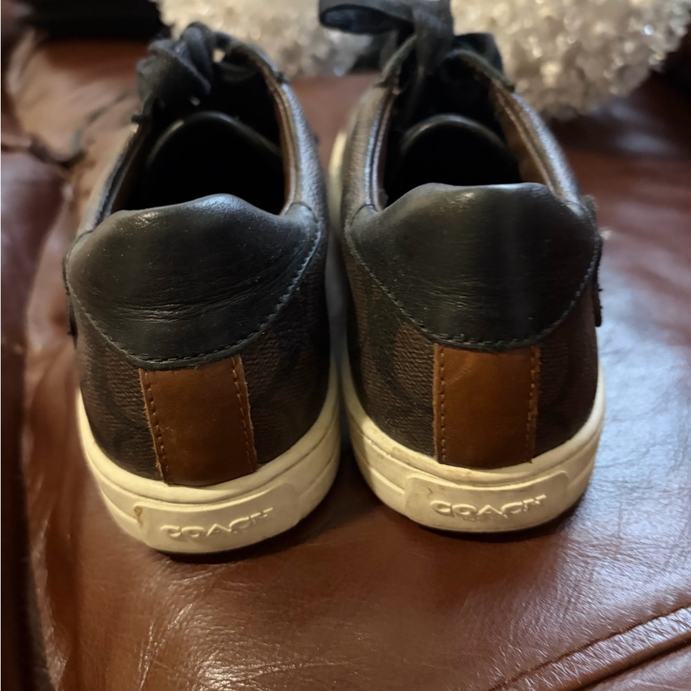 Coach women’s Black and Brown Leather Sneakers